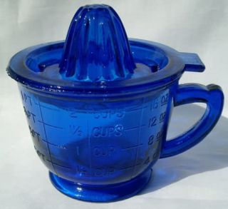 https://ea84614443a15b59df30-aacc334274c47471be1f50bc338c1edd.ssl.cf1.rackcdn.com/158881470_cobalt-blue-glass-2-cups-measuring-cup-with-juicer-lid.jpg