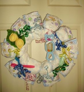 Diaper Cake Wreath in Pink, Blue, Yellow & Green with socks, spoons