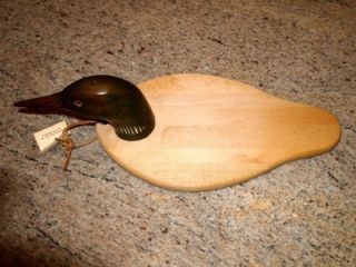 is a nice cheese or serving plate with a duck decoy head by JW DUXBURY