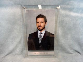 EUREKA NATHAN STARK ED QUINN FRAMED PICTURE & NOBLE PRIZE COLLECTIBLE
