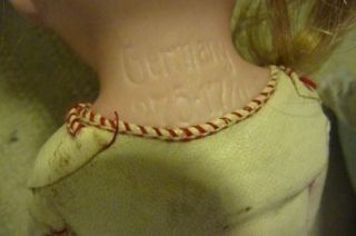 ANTIQUE GERMAN BISQUE CHILD DOLL OUR PET LABEL ON HER KID BODY