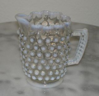  tiny pitcher or creamer in a pattern called elson dew drop made by the