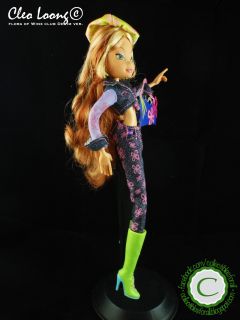  but in good condition flora from the denim line of winx club dolls