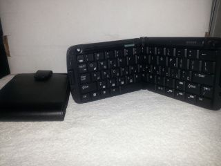FREEDOM WIRELESS KEYBOARD IN LEATHER CASE FOLDS TO SIZE OF 5 X 4 WORKS