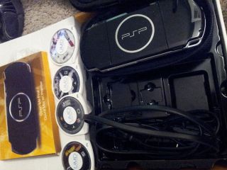 Sony PSP 3000 Piano Black Handheld System with Case and 4 Games