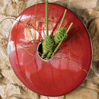   Red. Material Ceramic. Discus shape. Hangs on a keyhole $122.50