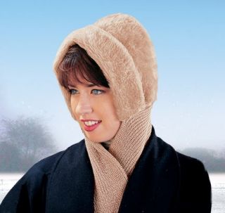 Attractive faux fur hat features an attached 4 foot long knit scarf