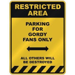 RESTRICTED AREA  PARKING FOR GORDY FANS ONLY  PARKING