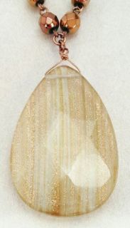Lia Sophia Cavaco necklace with glittery cream colored main stone