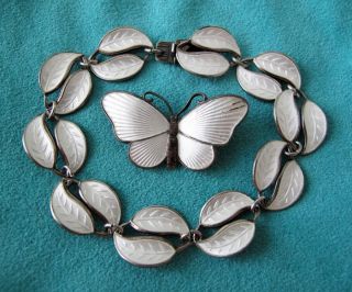 This auction is for the butterfly brooch only. David Andersen bracelet
