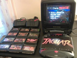 Atari Jaguar Console (NTSC)  2 controllers  13 Games  Power Supply
