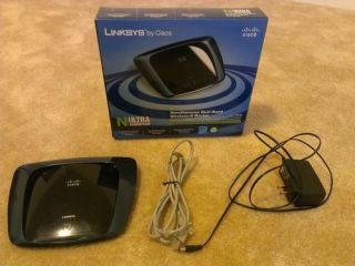 Linksys by Cisco WRT400N 300 Mbps 4 Port 10 100 Wireless Dual Band N