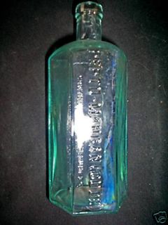Six Sided Pepto Mangan Gude Bottle