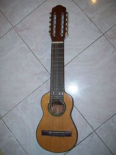 Charango, 10 string instrument. solid maple wood body