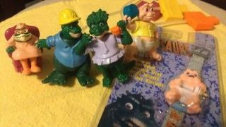 set of 4 toys and NEW Baby Sinclair watch   great collectible