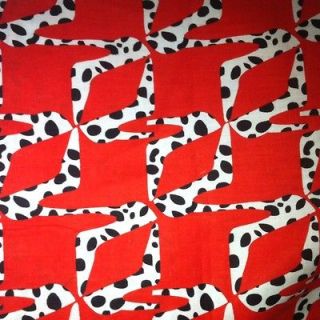 Dalmation Spots. Shoes With Animal Print On Red Fabric 1yard 100%