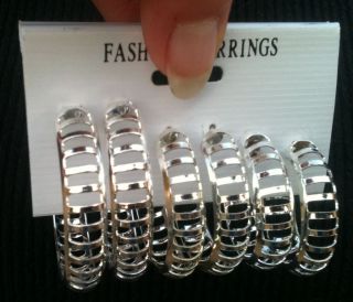 Earring LOOPS, silver plated descending catapiller look. see through.