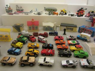 TONS OF MINI CARS, A TWON WITH TOW TRUCKS, PLANES, HELICOPTERS AND A