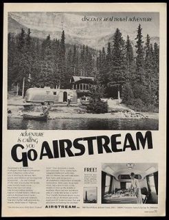 1968 Airstream streamlined travel trailer mountain house photo vintage