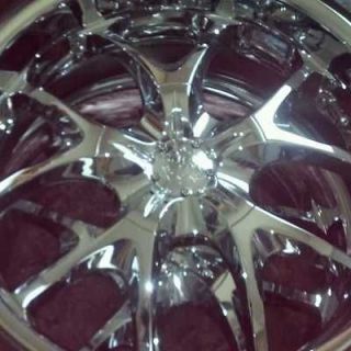Like new 22 inch chrome voodoo wheels with low profile tires