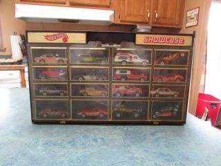 Hot Wheels Group of 17 Vehicles in Brown Carrying Case