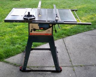 10 TABLE SAW 113.299040 CAST IRON. STAND WHEELS BLADES MANUALS INCHS