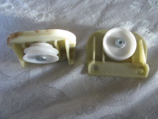 Small Plastic Pulley Wheels with Their Holding Brackets