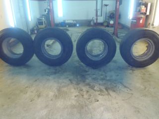 Tires 2 385 R22 5 front floats and 2 1200 R 22 5 drive tires with rims