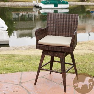 Braxton Pe Swivel Armed Barstool (Multi brown stool with beige cushionSome assembly requiredSturdy constructionNeutral colors to match any outdoor decorSwivel featureIdeal for extra seating in your backyard areaSeat height 27 inches (29 inches with cushi