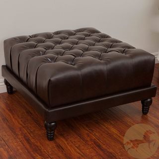 Christopher Knight Home Darwin Tufted Brown Bonded Leather Ottoman (BrownTufted topSturdy constructionNeutral colors to match any decorIdeal for extra seating in any roomCarved espresso stained hardwood legsDimensions 17 inches high x 30 inches wide x 30
